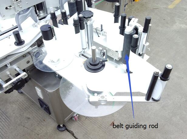 பொருள் கண்டறிதல் மேஜிக் கண் தானியங்கி இரட்டை பக்க ஸ்டிக்கர் லேபிளிங் இயந்திரம் டர்ன்டபிள் மூலம்