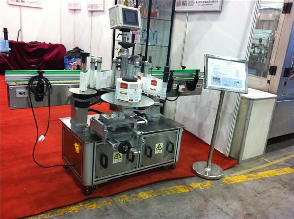 ஹமி முலாம்பழம் / டிராகன் பழச்சாறு சுற்று பாட்டில் ஸ்டிக்கர் லேபிளிங் இயந்திர பானம் புலம்